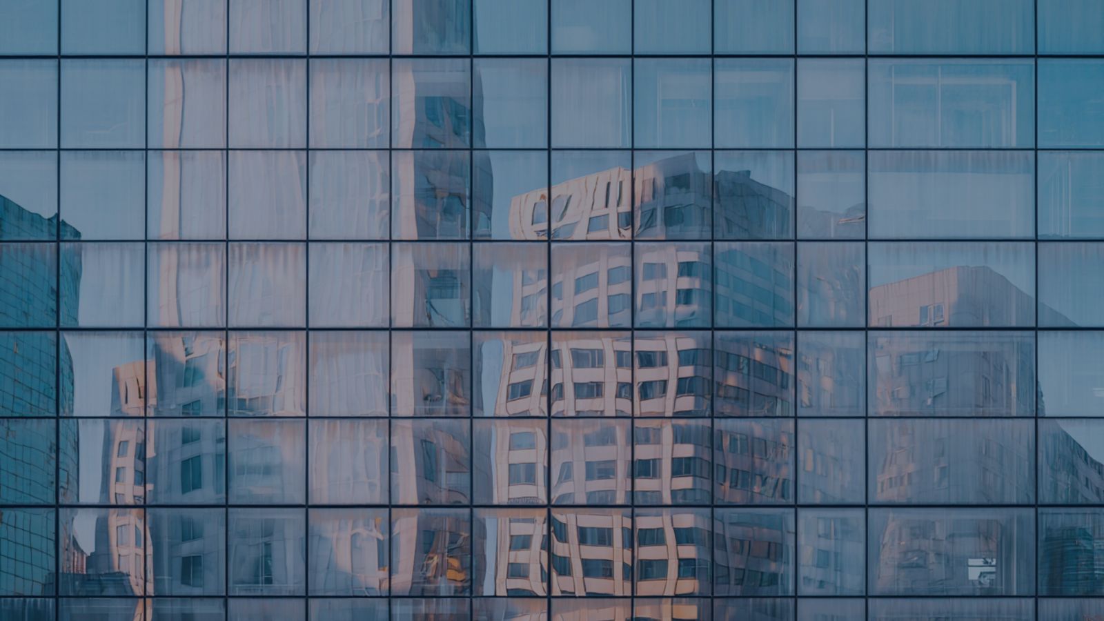 Reflections on a glass office facade